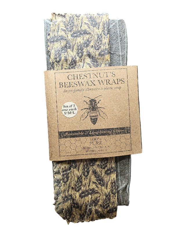 Beeswax wraps with a cardboard label on a dark surface