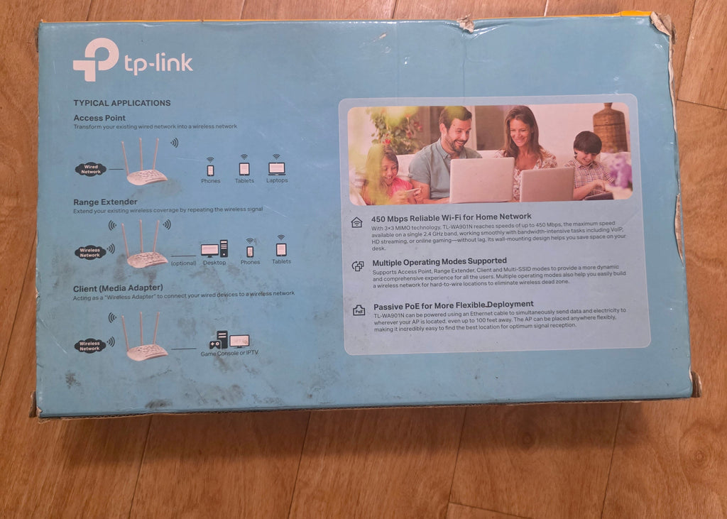 TP-Link router box on a wooden floortoaashop.com,toaa,thriftonline, thrift online, second hand, used stuff,

