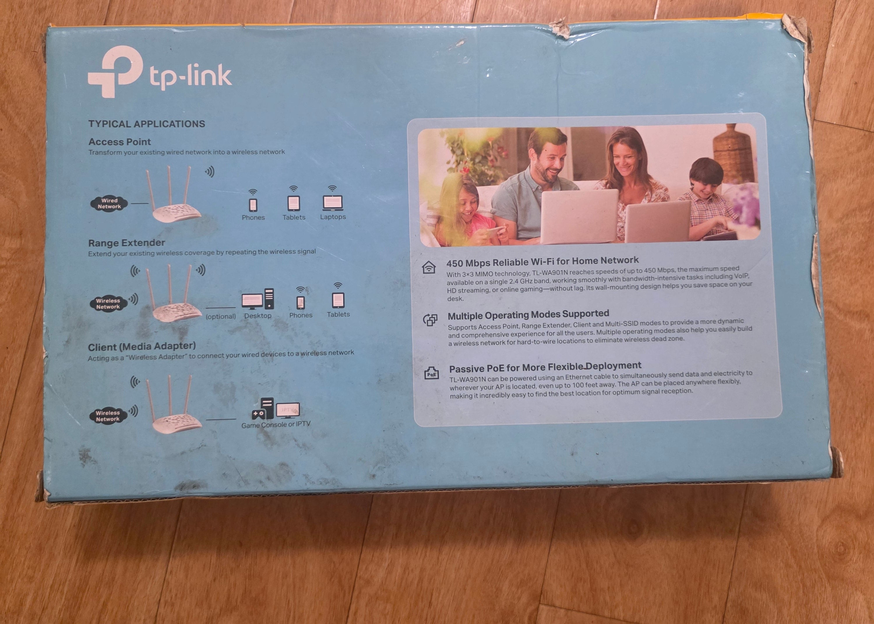 TP-Link router box on a wooden floortoaashop.com,toaa,thriftonline, thrift online, second hand, used stuff,
