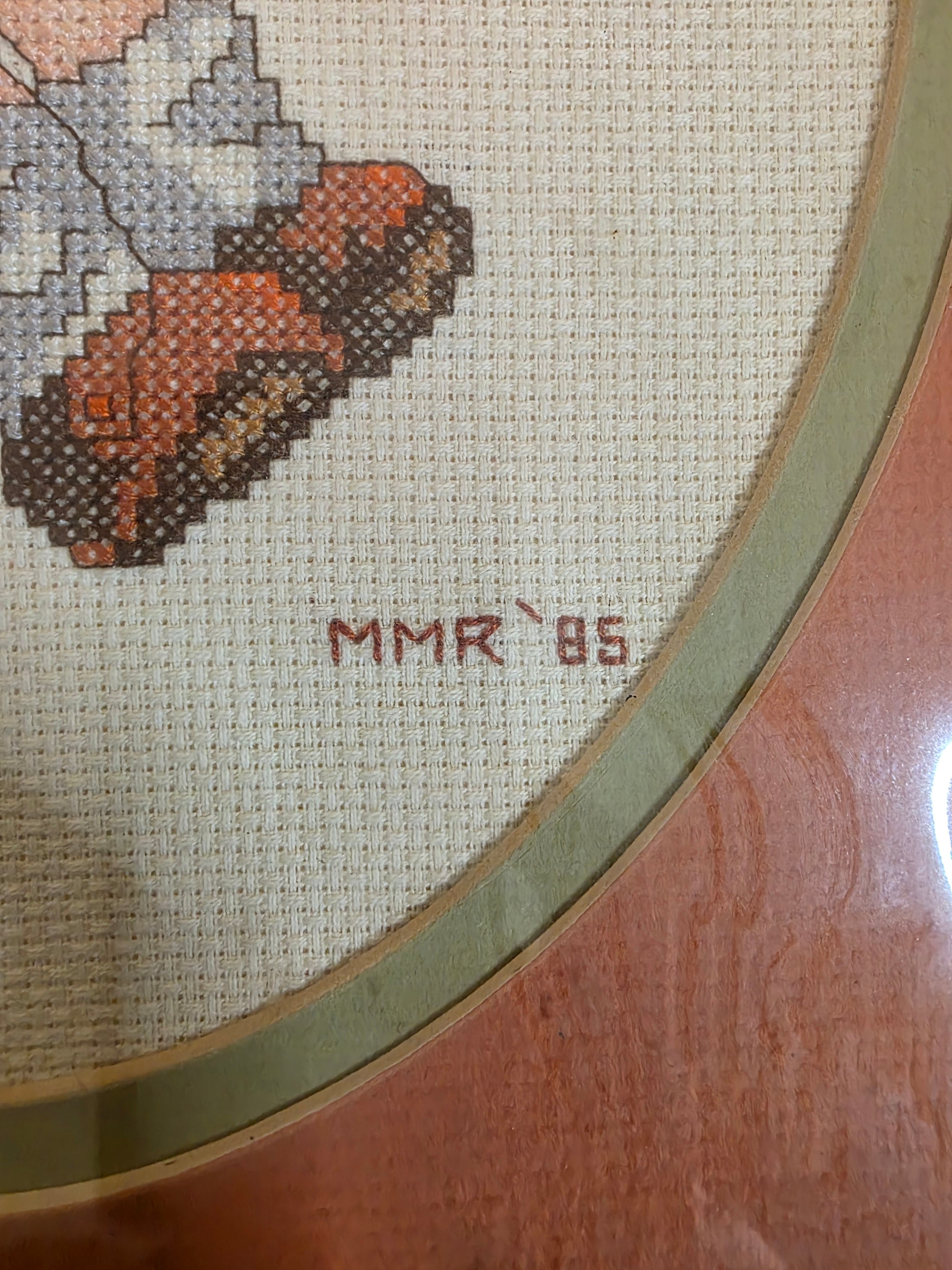 Cross-stitched bird design on fabric with a wooden hooptoaashop.com,toaa,thriftonline, thrift online, second hand, used stuff,