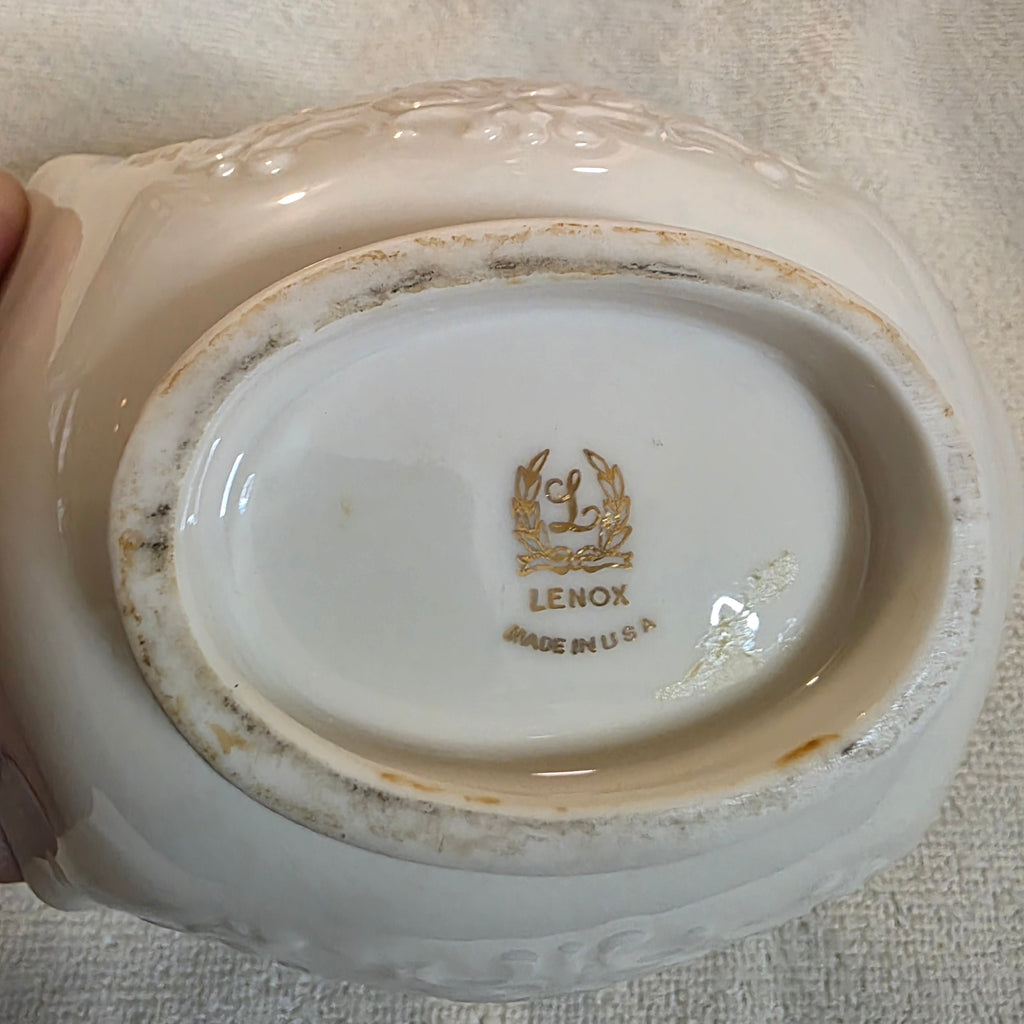 Back of a Lenox china dish with visible branding on a textured surface, Toaashop.com