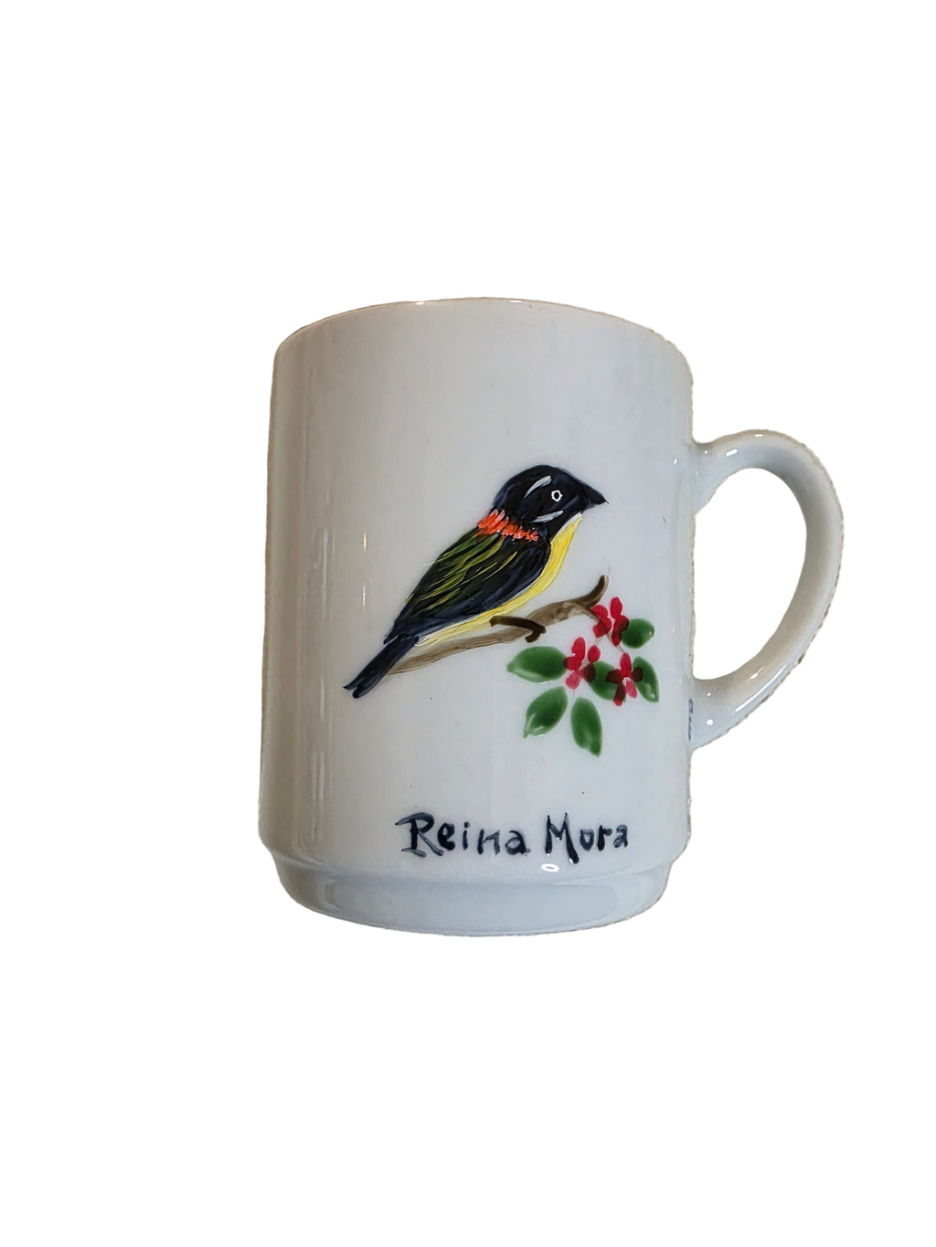 White mug with a bird and berry design on a textured beige surface thrift online, Acv2, TOAA shop, Toaa, TOA, toaaa shop, Silvio, jaiba, second hand, used stuff